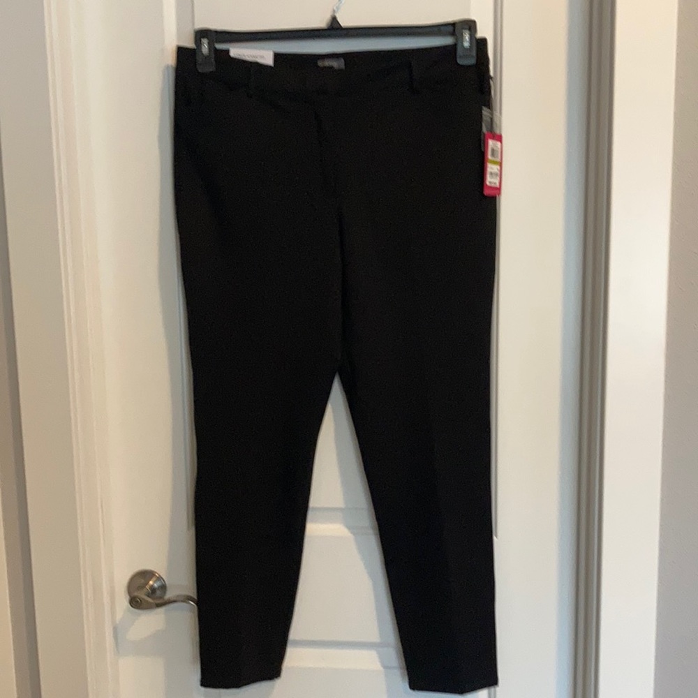 Traditional deep black slacks.